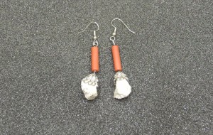 The ear-rings were made from ramp rubble by Faculty of Arts student enrolment advisor Karen Hecker. Objects held at York Libraries, Clara Thomas Archives and Special Collection. Photo courtesy the author.