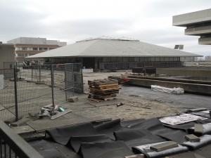 The Scott Religious Centre a gray December day in 2014 surrounded by construction material used to patch the leaking floor of the terrace. Photo courtesy the author.