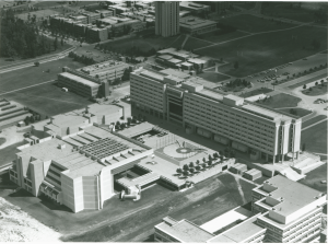 An oblique air photograph of the York University showing the Ross Building terrace as the central focus of the campus. Photo courtesy of York University Libraries, Clara Thomas Archives and Special Collection, AC19501.
