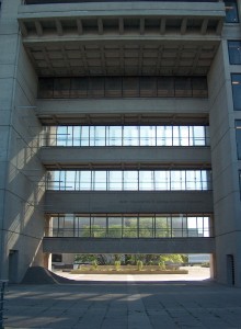 The “primordial temple front” of the Ross Building. The statement of Murray Ross is located at the bottom concrete bar which is part of glass-walled corridors that connect the south and north end of the building. Photo courtesy the author.